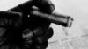 A man smokes a cigar in Washington, D.C. (D. Bekheet/VOA)