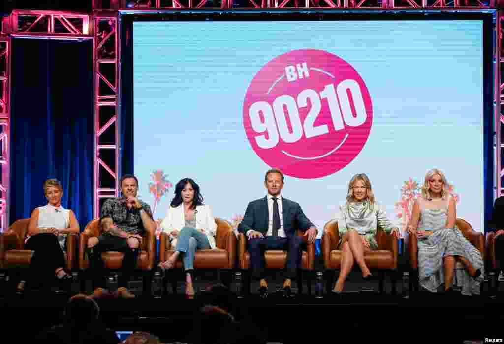 From left to right: Cast members Gabrielle Carteris, Brian Austin Green, Shannen Doherty, Ian Ziering, Jennie Garth and Tori Spelling attend a panel for the Fox television series "BH90210" during the Summer Television Critics Association Press Tour in Beverly Hills, California, Aug. 7, 2019.