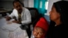 FILE - Anwar, 4, gets treated for tuberculosis at the Kashi Vidyapith block hospital near Varanasi, India, Feb. 1, 2014.