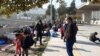 Families crowd together in the streets despite coronavirus fears, in Izmir, Turkey, April 13, 2020. (Photo courtesy of refugees)
