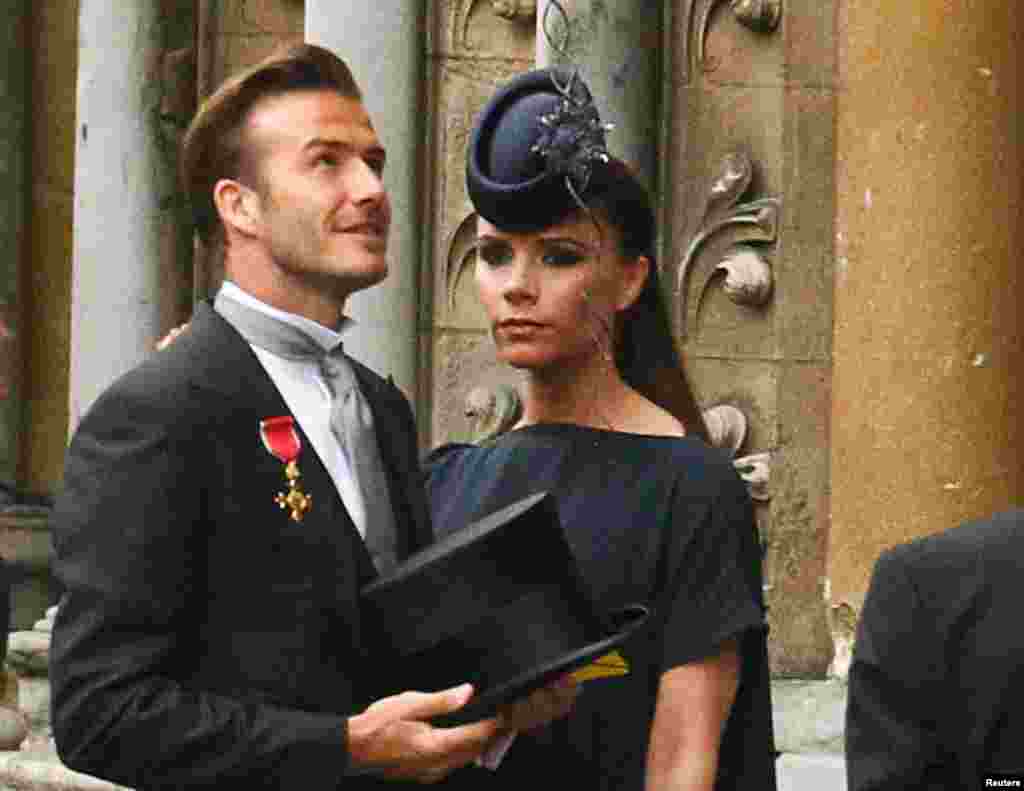 The Beckhams arrive at Westminster Abbey before the wedding of Britain's Prince William and Kate Middleton, in London April 29, 2011.