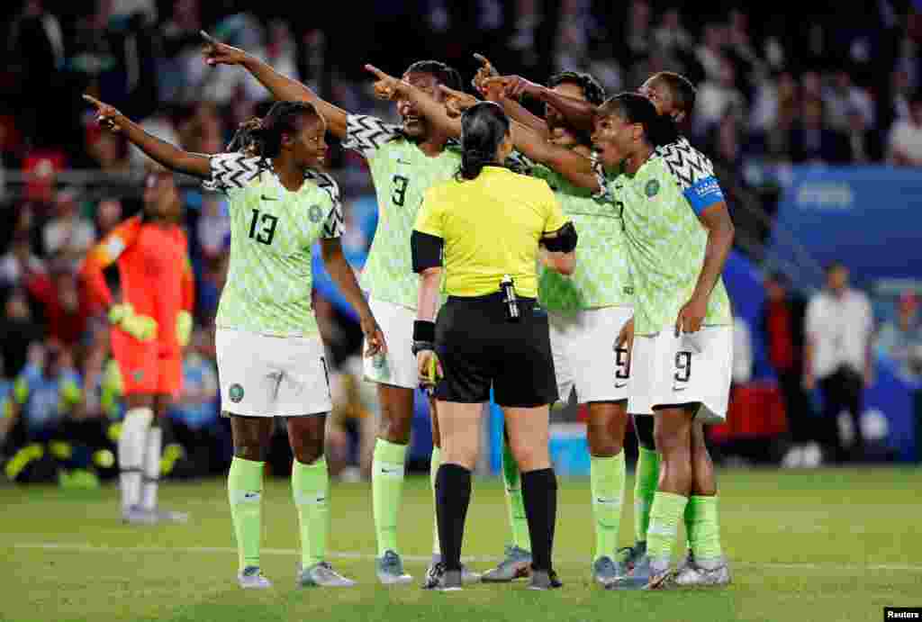 Nigeria players remonstrate with referee Melissa Borjas during their match against France at the Women's World Cup in Rennes, France, June 17, 2019.