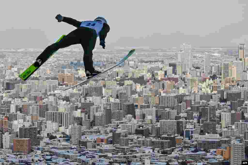 Danil Vassilyev of Kazakhstan takes part in a training run before the start of the qualifying round for the men's FIS Ski Jumping World Cup competition in Sapporo.