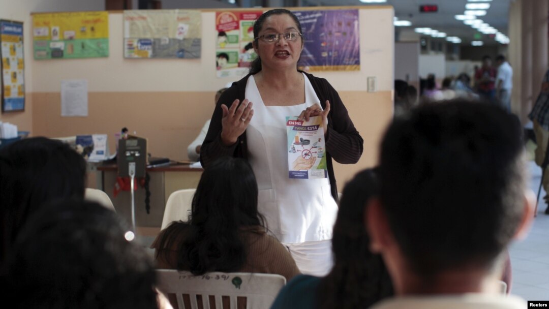 Patients participate in a Zika prevention talk as they wait to be attended to at the Women's National Hospital in San Salvador, El Salvador, Jan. 29, 2016. 