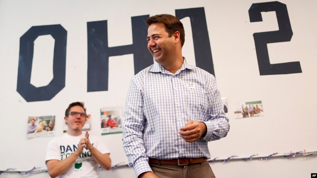 Democrat Danny O'Connor, the Franklin County recorder, meets with volunteers at his campaign headquarters, Tuesday, Aug. 7, 2018, in Columbus. 