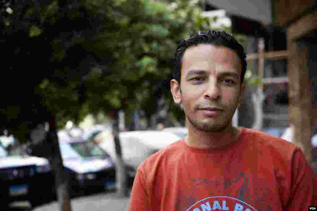 Mahmoud, a doorman in Cairo, Egypt, said &quot;[Obama] could help Egypt. He&#39;s a good man, and Egypt likes him...He is loved in Cairo.&quot; (Y. Weeks/VOA) 