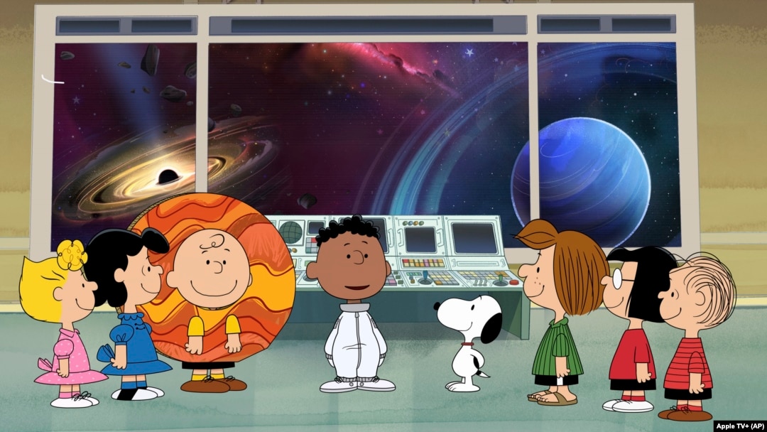 SNOOPY-EN EL ESPACIO