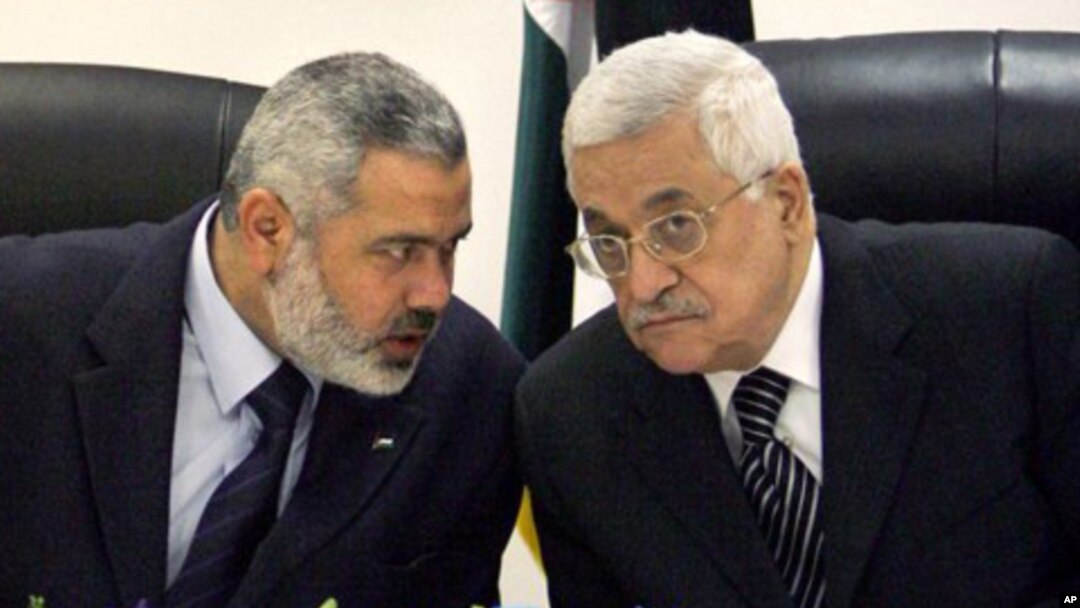 Palestinian Authority President Mahmoud Abbas, right, and senior Hamas political leader Ismail Haniyeh (file photo)