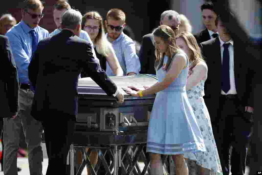 Pallbearers guide the casket to a waiting hearse after the memorial service for Kendrick Castillo, who was killed in the assault on the STEM Highlands Ranch School, May 15, 2019, in Highlands Ranch, Colorado.