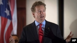 FILE - Sen. Rand Paul, R-Ky., shown speaking to supporters in Hebron, Ky., Aug. 11, 2017, was "blindsided" by an attacker but is now "fine," a spokeswoman said.