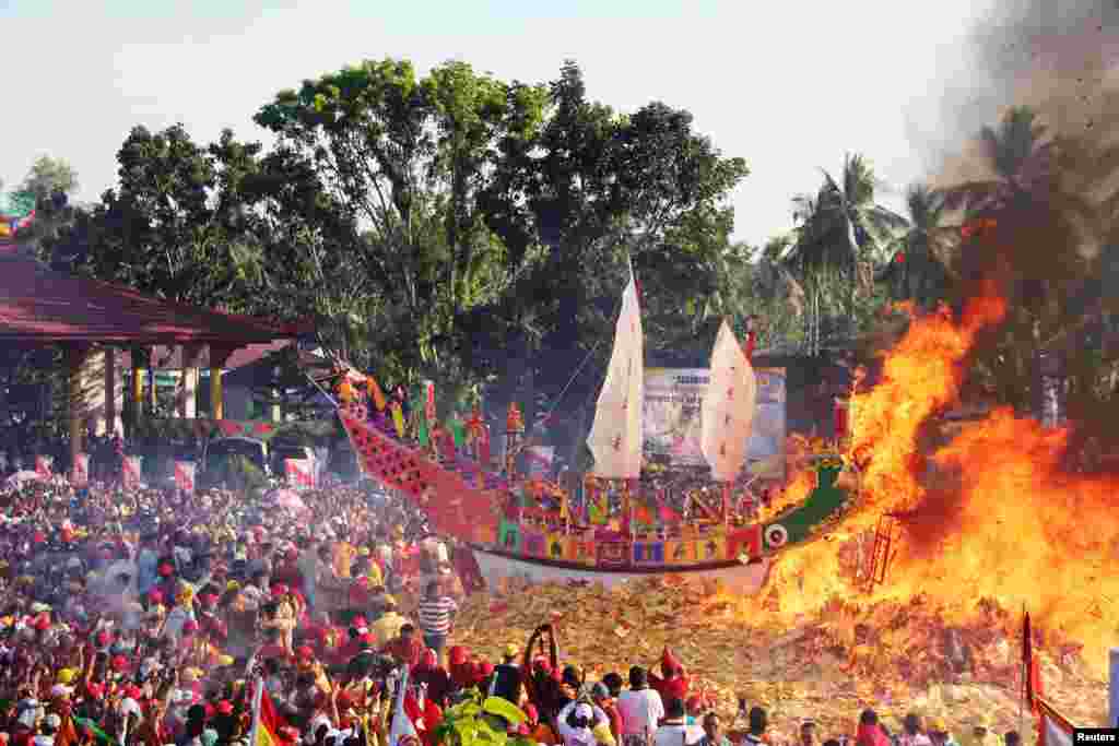 Konghucu worshipers attend the Bakar Tongkang ritual in Bagansiapiapi, Riau province, Indonesia, in this photo taken by Antara Foto.