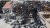After ten years of war, protesters still gather in 'Seven Lakes' roundabout to call for the fall of the government on Feb. 26, 2021 in Idlib, Syria. (Mohammad Daboul/VOA)