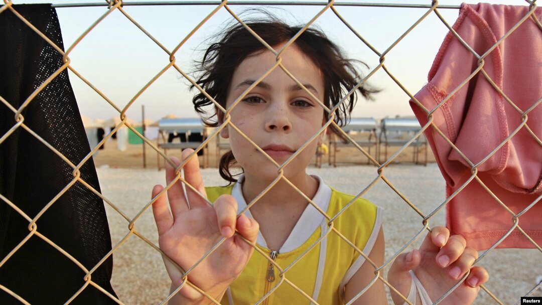 A Syrian refugee is pictured at the Al Zaatri refugee camp in the Jordanian city of Mafraq, near the border with Syria, July 31, 2012. 
