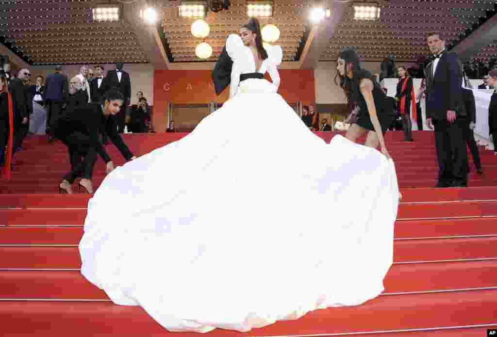 Actress Deepika Padukone poses for photographers upon arrival at the premiere of the film 'Rocketman' at the 72nd international film festival, Cannes, southern France.