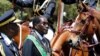 FILE - Zimbabwe's President Robert Mugabe arrives for the opening of Parliament in Harare, Zimbabwe, Oct. 6, 2016. 