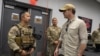 Pentagon chief tours Guantanamo Bay as more detainees arrive