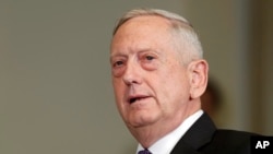 FILE - Defense Secretary Jim Mattis speaks at the Pentagon, Aug. 15, 2017. 