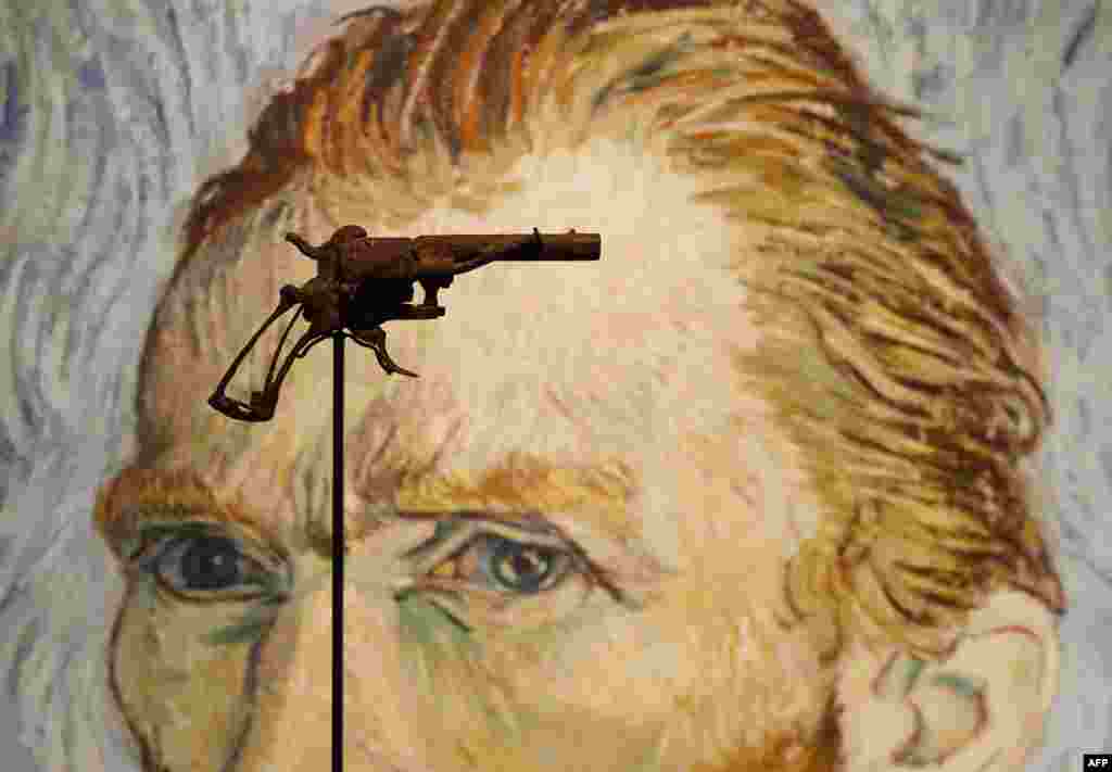 A revolver believed to be the gun Dutch 19th century painter Vincent Van Gogh would have used to kill himself on 27 July 1890 is on public display on June 14, 2019 at Paris' Drouot auction house before it goes under the hammer later today.