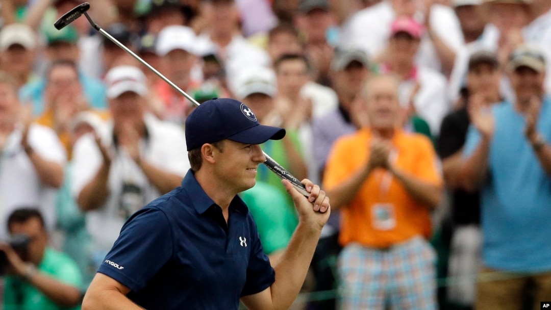 Jordan Spieth celebrates after winning the Masters golf tournament Sunday, April 12, 2015, in Augusta, Ga.