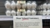 FILE - A notice to customers is pictured near eggs for sale at a grocery store in Lyndhurst, N.J., Feb. 4, 2025. 