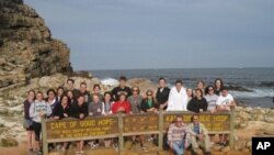 Dr. William Finlay (seated right) on a hike with a study-abroad group in South Africa.