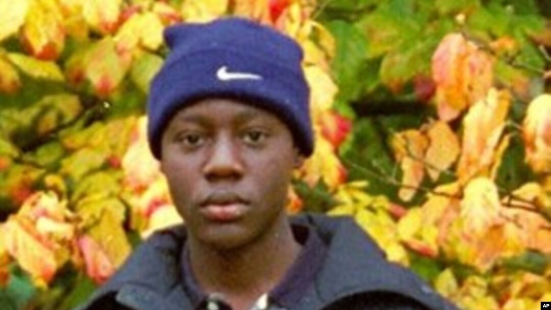 In this 2001 image made available Dec. 28, 2009 by teacher Mike Rimmer, Nigerian Umar Farouk Abdulmutallab poses with a group of fellow pupils from Lome's International School, Togo, while on a school trip to London.