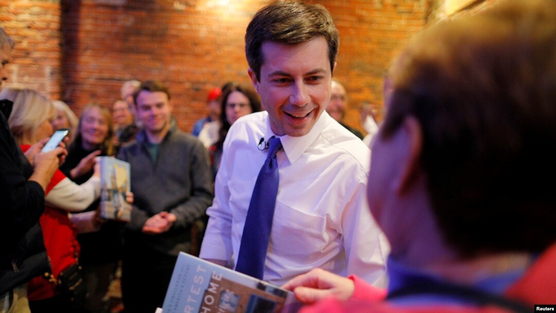 Democratic 2020 U.S. presidential candidate Pete Buttigieg greets voters during a campaign stop at Portsmouth Gas Light, in Portsmouth, New Hampshire, March 8, 2019.