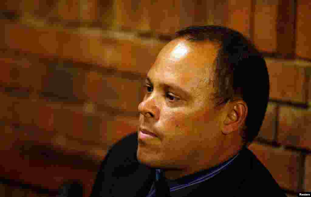 Investigating officer Hilton Botha, the lead detective in the Pistorius murder case, during a break in proceedings, February 21, 2013.